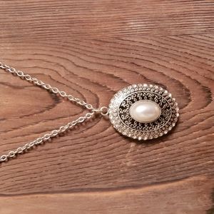 Faux pearl long locket necklace